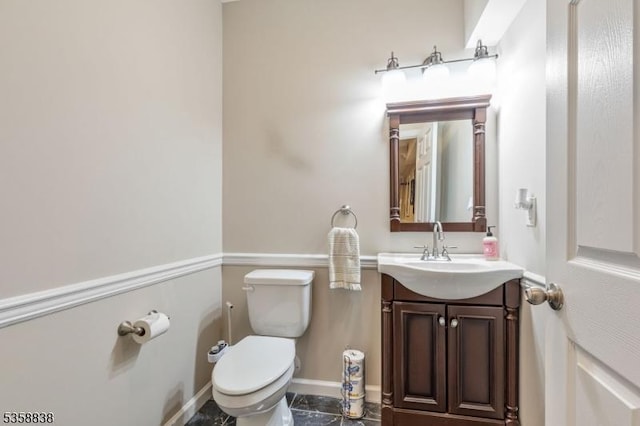 411 Arlington Ave, South Plainfield Boro, NJ 07080 - half bath featuring toilet, vanity, and baseboards
