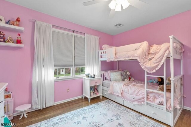 411 Arlington Ave, South Plainfield Boro, NJ 07080 - bedroom featuring wood finished floors, a ceiling fan, and baseboards