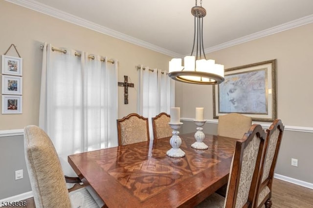 411 Arlington Ave, South Plainfield Boro, NJ 07080 - dining room with crown molding, baseboards, a chandelier, and wood finished floors
