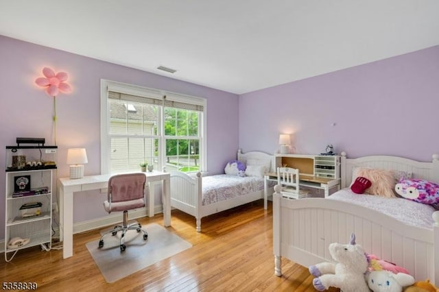 1364 Springfield Ave, New Providence Boro, NJ 07974 - bedroom featuring light wood-type flooring and a desk