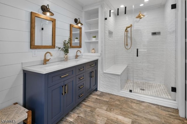 6 Ironia Rd, Chester Twp, NJ 07836 - bathroom with double vanity, a stall shower, and wood finished floors