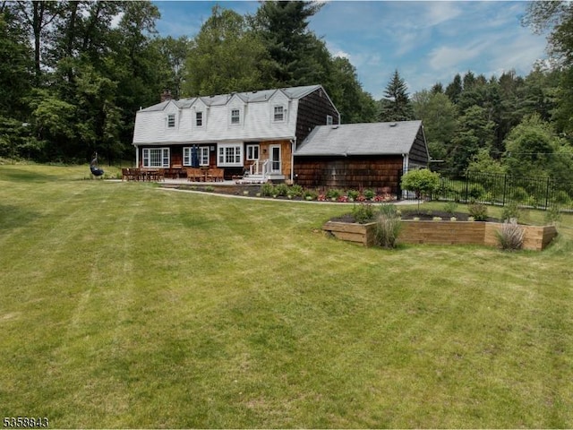 6 Ironia Rd, Chester Twp, NJ 07836 - view of front facade featuring a garden, a gambrel roof, and a chimney