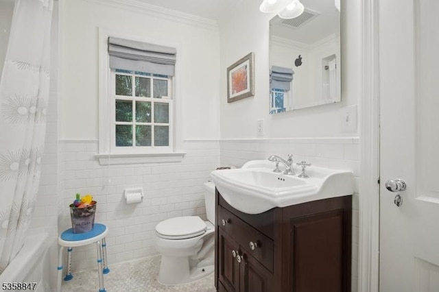 47 Barnsdale Rd, Millburn Twp, NJ 07078 - bathroom featuring tile walls, vanity, a wainscoted wall, toilet, and tile patterned floors