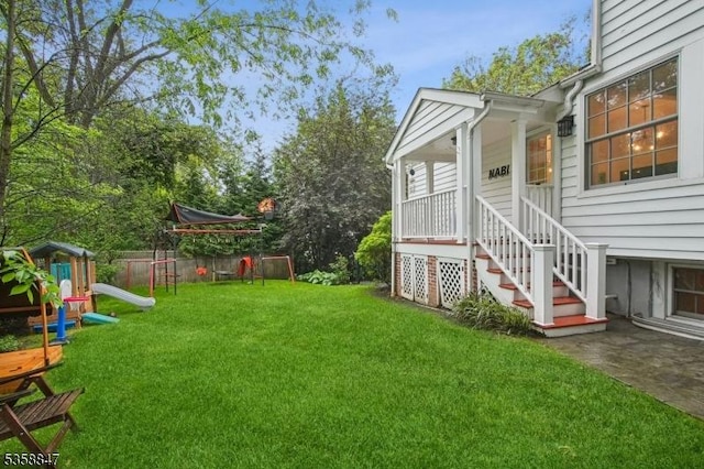 47 Barnsdale Rd, Millburn Twp, NJ 07078 - view of grassy yard with a playground