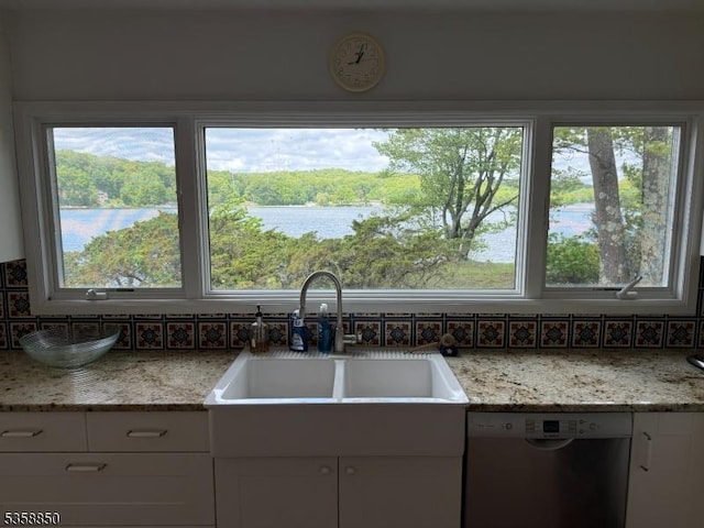 120 Island Rd, Vernon Twp, NJ 07422 - kitchen featuring dishwashing machine, tasteful backsplash, plenty of natural light, and white cabinets