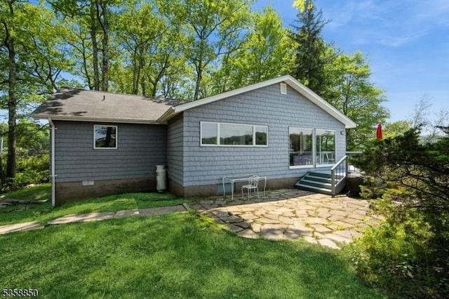 120 Island Rd, Vernon Twp, NJ 07422 - rear view of property with a patio, a lawn, and a shingled roof