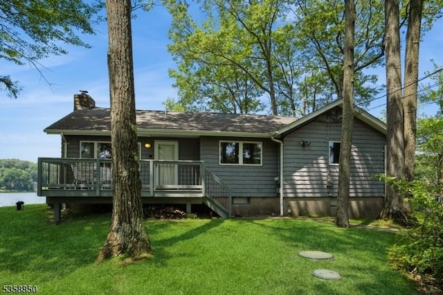120 Island Rd, Vernon Twp, NJ 07422 - rear view of house with a chimney, a yard, and a deck