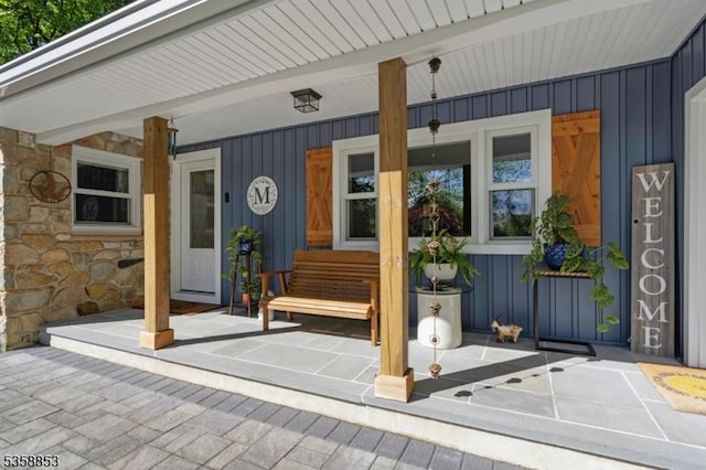 439 Mountain View Rd, Franklin Twp, NJ 08802 - entrance to property with board and batten siding, a porch, and stone siding