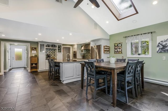 439 Mountain View Rd, Franklin Twp, NJ 08802 - dining space with plenty of natural light, recessed lighting, a skylight, a ceiling fan, and baseboard heating