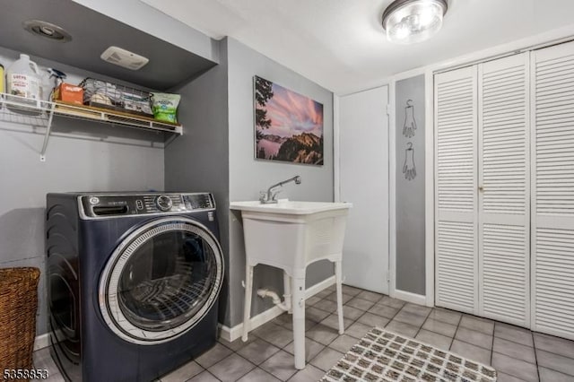 439 Mountain View Rd, Franklin Twp, NJ 08802 - laundry room with washer / clothes dryer, light tile patterned floors, and baseboards