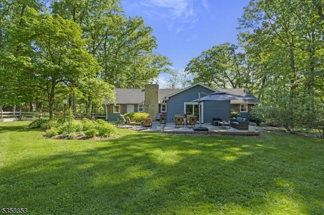 439 Mountain View Rd, Franklin Twp, NJ 08802 - rear view of property featuring a patio area and a chimney