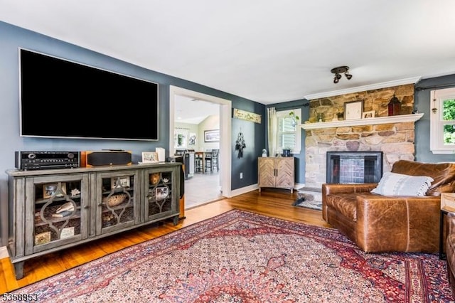 439 Mountain View Rd, Franklin Twp, NJ 08802 - living area featuring wood finished floors, healthy amount of natural light, a fireplace, and baseboards