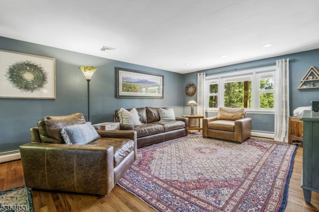 439 Mountain View Rd, Franklin Twp, NJ 08802 - living room featuring wood finished floors, a baseboard heating unit, baseboards, and recessed lighting