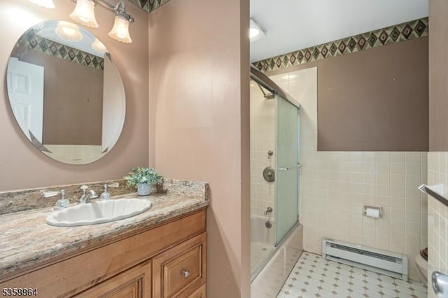 44 Stanhope Rd, Sparta Twp, NJ 07871 - full bathroom featuring a baseboard radiator, vanity, enclosed tub / shower combo, and tile walls