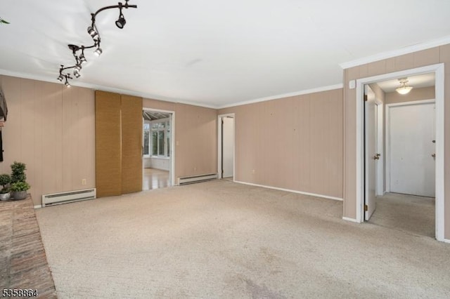 44 Stanhope Rd, Sparta Twp, NJ 07871 - unfurnished living room with a baseboard radiator, crown molding, carpet, and wooden walls