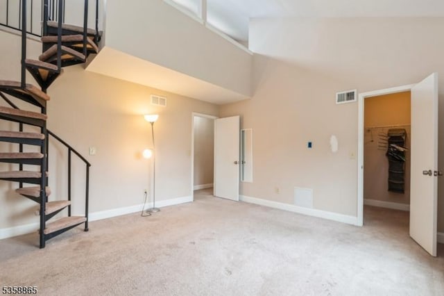 182 Dakota Dr, Andover Twp, NJ 07848 - unfurnished living room with carpet, stairs, and baseboards