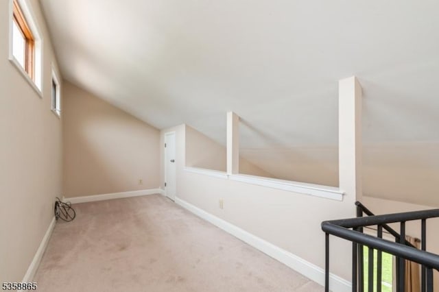 182 Dakota Dr, Andover Twp, NJ 07848 - bonus room featuring carpet floors, lofted ceiling, and baseboards