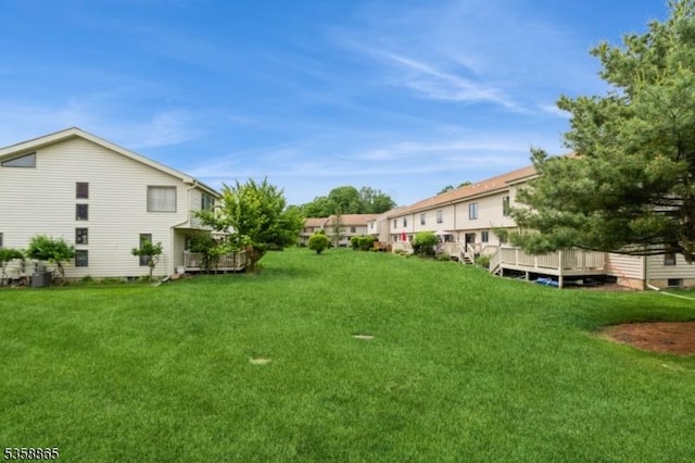 182 Dakota Dr, Andover Twp, NJ 07848 - view of grassy yard with a deck and central AC unit
