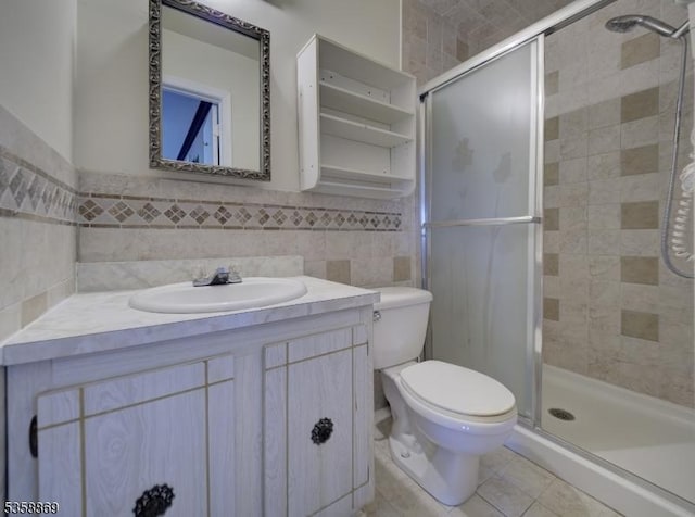1068 Robin Rd, Hillsborough Twp, NJ 08844 - bathroom featuring tile walls, vanity, a stall shower, and tile patterned floors