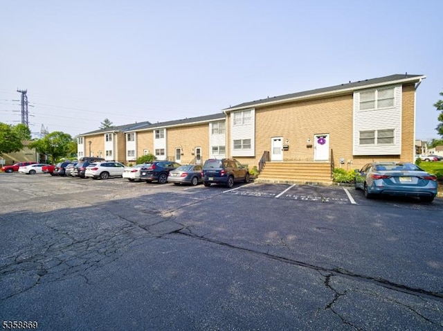 1068 Robin Rd, Hillsborough Twp, NJ 08844 - view of building exterior featuring uncovered parking