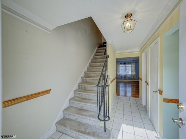1068 Robin Rd, Hillsborough Twp, NJ 08844 - staircase featuring tile patterned flooring and crown molding
