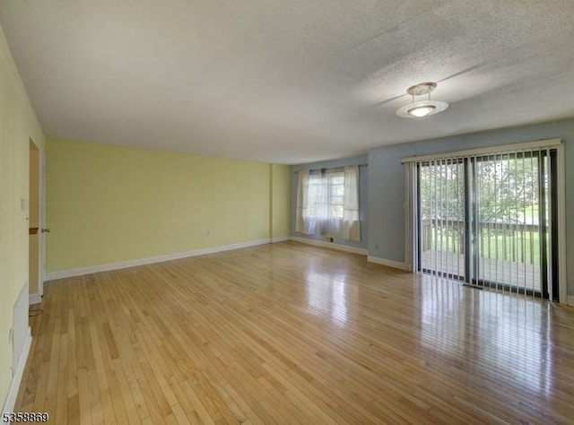 1068 Robin Rd, Hillsborough Twp, NJ 08844 - unfurnished room with light wood-style flooring and baseboards