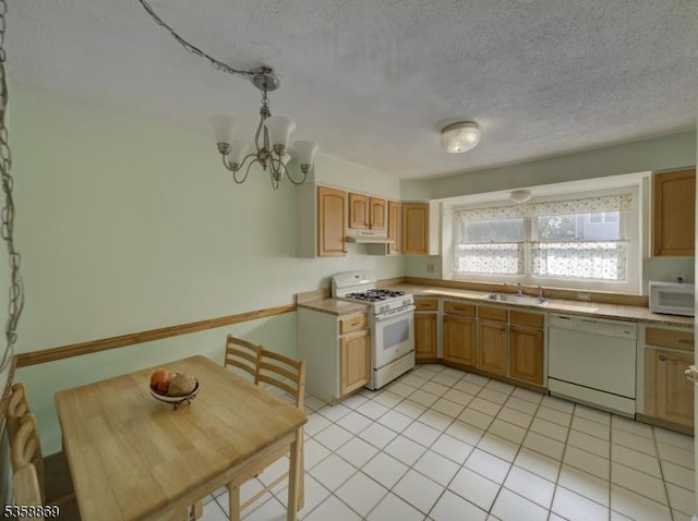 1068 Robin Rd, Hillsborough Twp, NJ 08844 - kitchen with white appliances, a chandelier, a textured ceiling, under cabinet range hood, and light countertops