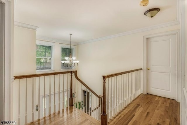 221 Sussex Ave, Andover Twp, NJ 07860 - staircase with a chandelier, wood finished floors, and ornamental molding