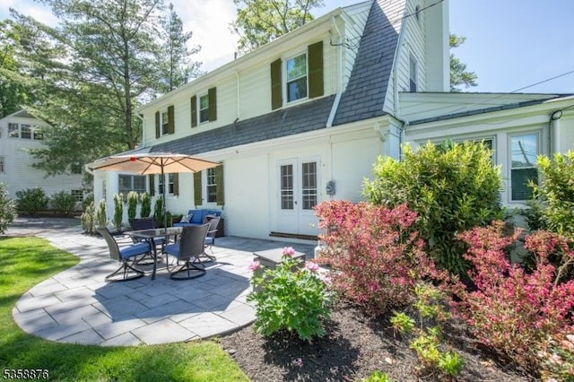 1 Spring Brook Rd, Morris Twp, NJ 07960 - back of house featuring a patio area, french doors, a chimney, and stucco siding
