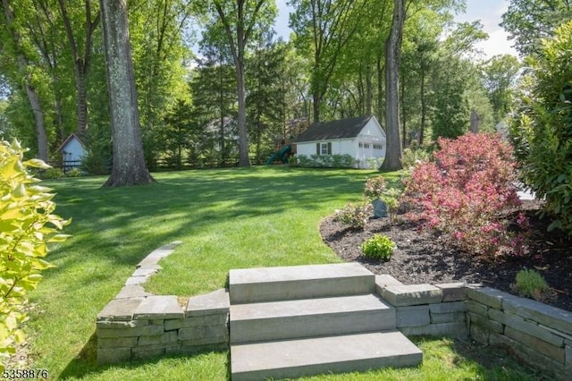 1 Spring Brook Rd, Morris Twp, NJ 07960 - view of green lawn featuring a playground and an outdoor structure