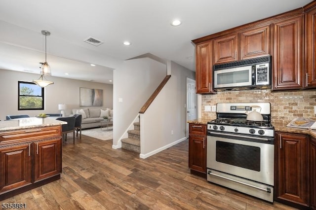 74-76 Watsessing Ave, Belleville Twp, NJ 07109 - kitchen featuring stainless steel appliances, dark wood finished floors, decorative backsplash, pendant lighting, and recessed lighting