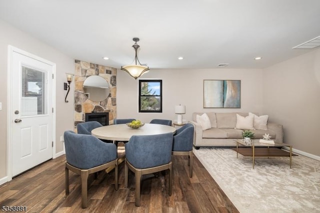 74-76 Watsessing Ave, Belleville Twp, NJ 07109 - dining space featuring dark wood-style floors, a fireplace, baseboards, and recessed lighting