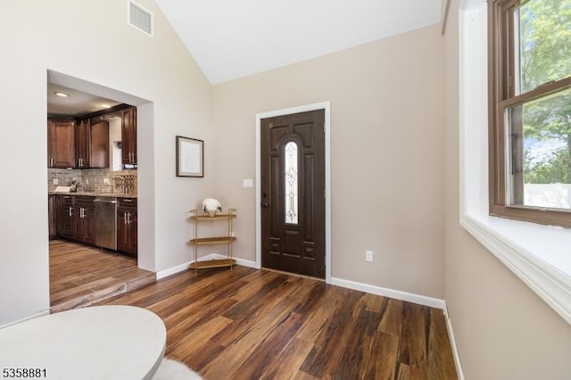 74-76 Watsessing Ave, Belleville Twp, NJ 07109 - foyer entrance with dark wood-style floors, baseboards, and high vaulted ceiling