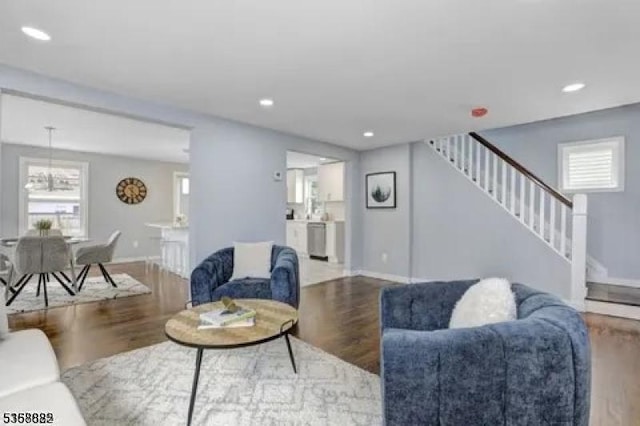 39 Emma St, Plainfield City, NJ 07063 - living room featuring healthy amount of natural light, stairs, wood finished floors, baseboards, and recessed lighting