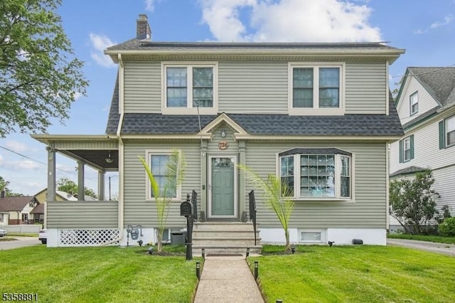 724-726 Central St, Plainfield City, NJ 07060 - view of front of home featuring a front lawn, a chimney, and roof with shingles