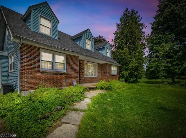 705 Warren Glen Rd, Greenwich Twp, NJ 08804 - cape cod house featuring brick siding and a front lawn