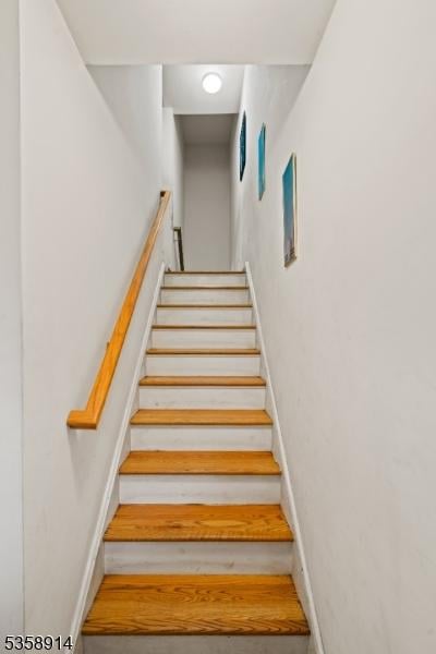 staircase with baseboards