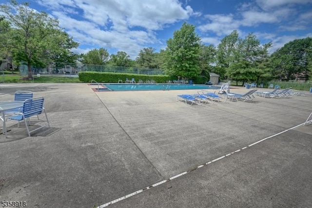 62 Taylor Dr, Franklin Twp, NJ 08823 - community pool featuring a patio area