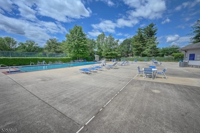 62 Taylor Dr, Franklin Twp, NJ 08823 - community pool with a patio