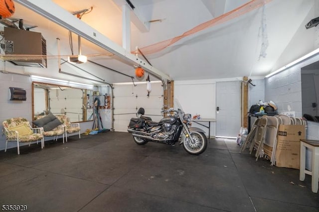 118 Holly St, Woodbridge Twp, NJ 07064 - garage with a garage door opener and concrete block wall