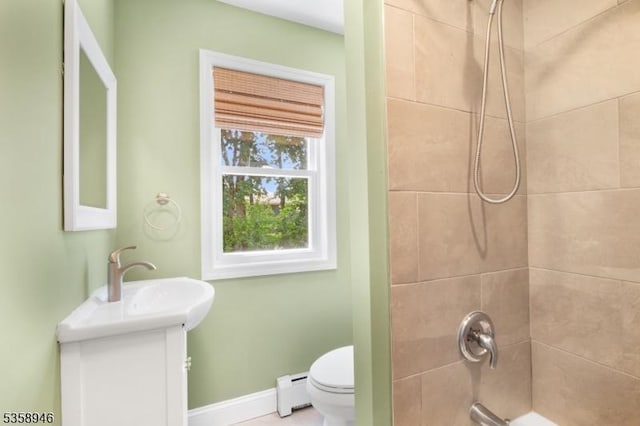 3 Raritan Ave, Roxbury Twp, NJ 07852 - bathroom with toilet, vanity, a baseboard heating unit, shower / bathtub combination, and baseboards