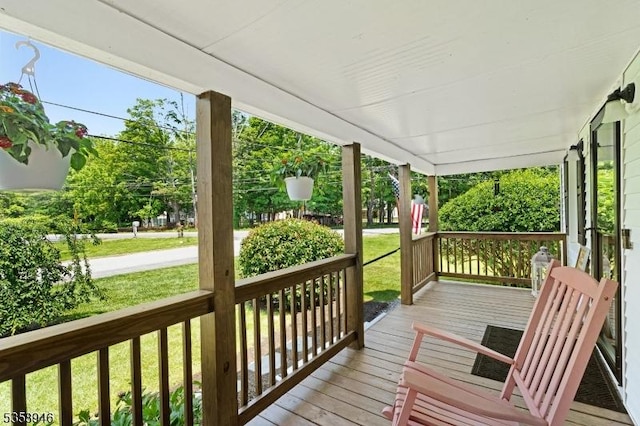 3 Raritan Ave, Roxbury Twp, NJ 07852 - wooden porch featuring a yard