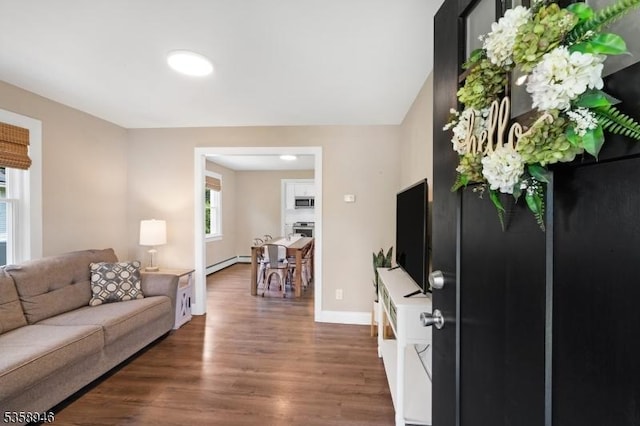 3 Raritan Ave, Roxbury Twp, NJ 07852 - living room with baseboard heating, wood finished floors, and baseboards