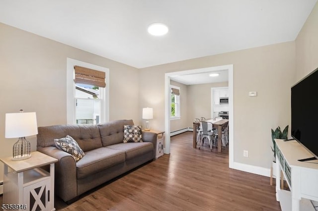 3 Raritan Ave, Roxbury Twp, NJ 07852 - living room featuring a baseboard radiator, wood finished floors, plenty of natural light, and baseboards