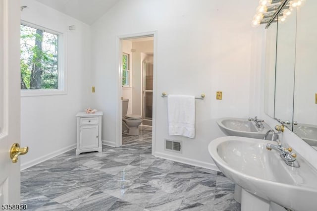 434 Bellemead Griggstown Rd, Montgomery Twp, NJ 08502 - bathroom with marble tiled flooring, vaulted ceiling, a sink, toilet, and baseboards
