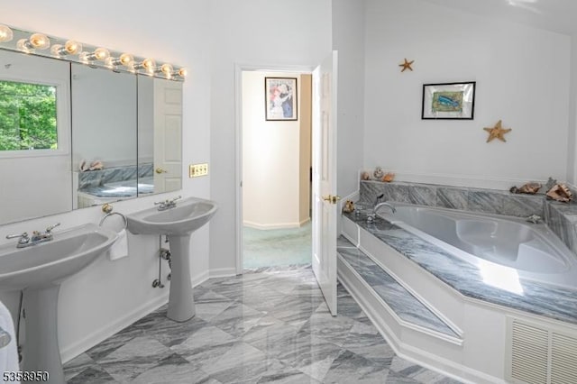 434 Bellemead Griggstown Rd, Montgomery Twp, NJ 08502 - bathroom with marble look tiles, a bath, a sink, and baseboards