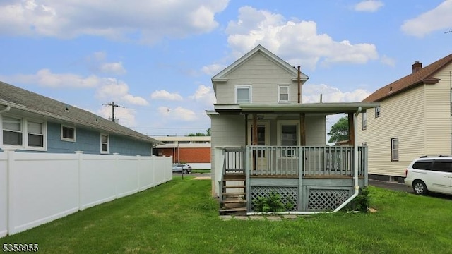 118 S 7th Ave, Manville Boro, NJ 08835 - rear view of property featuring a porch