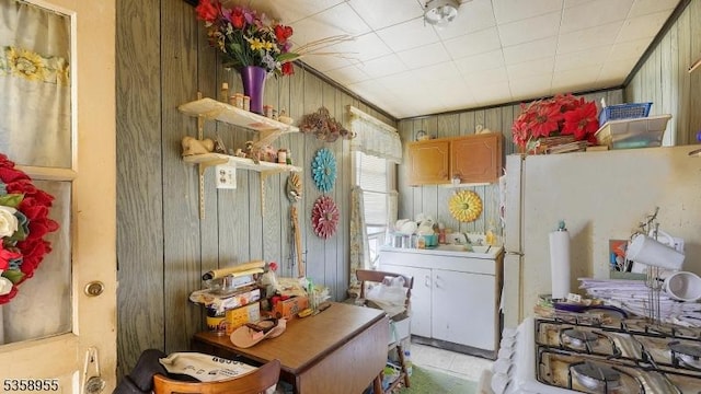 118 S 7th Ave, Manville Boro, NJ 08835 - kitchen with wooden walls, a sink, and gas range gas stove