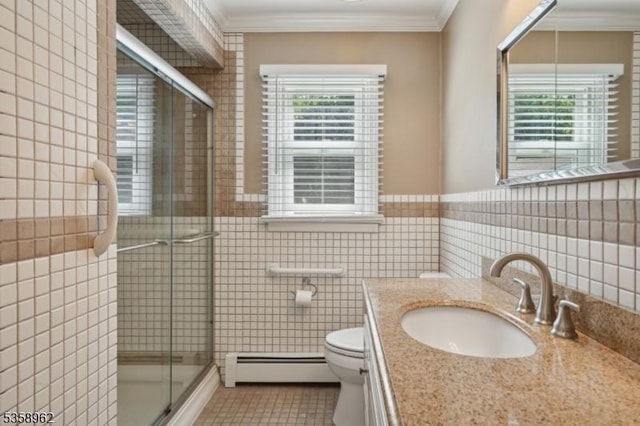 7 Dells Dr, Denville Twp, NJ 07834 - full bathroom with a baseboard heating unit, tile walls, plenty of natural light, tile patterned flooring, and toilet