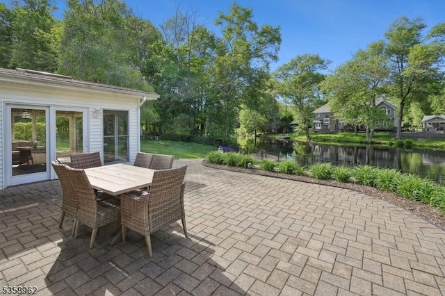 7 Dells Dr, Denville Twp, NJ 07834 - view of patio with a water view and outdoor dining area